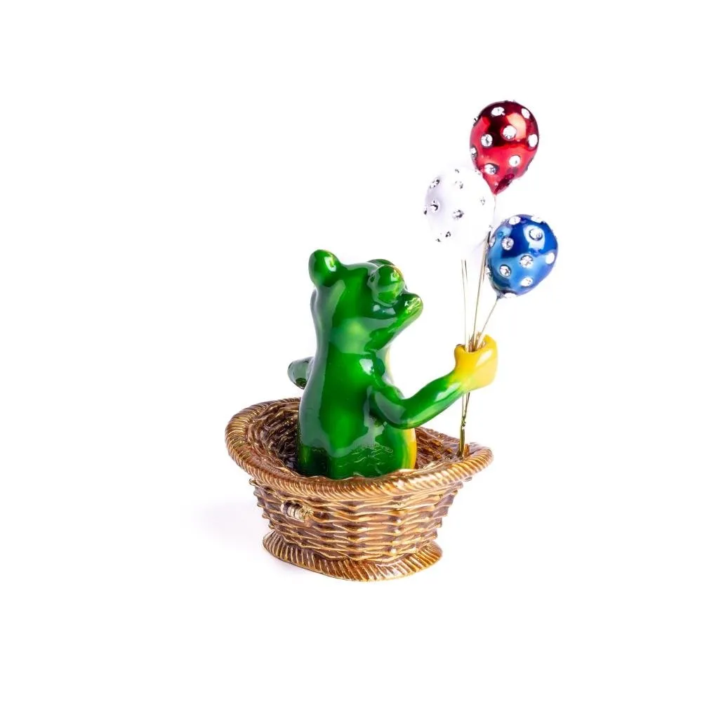 Frog Sitting in a Basket Holding Balloons