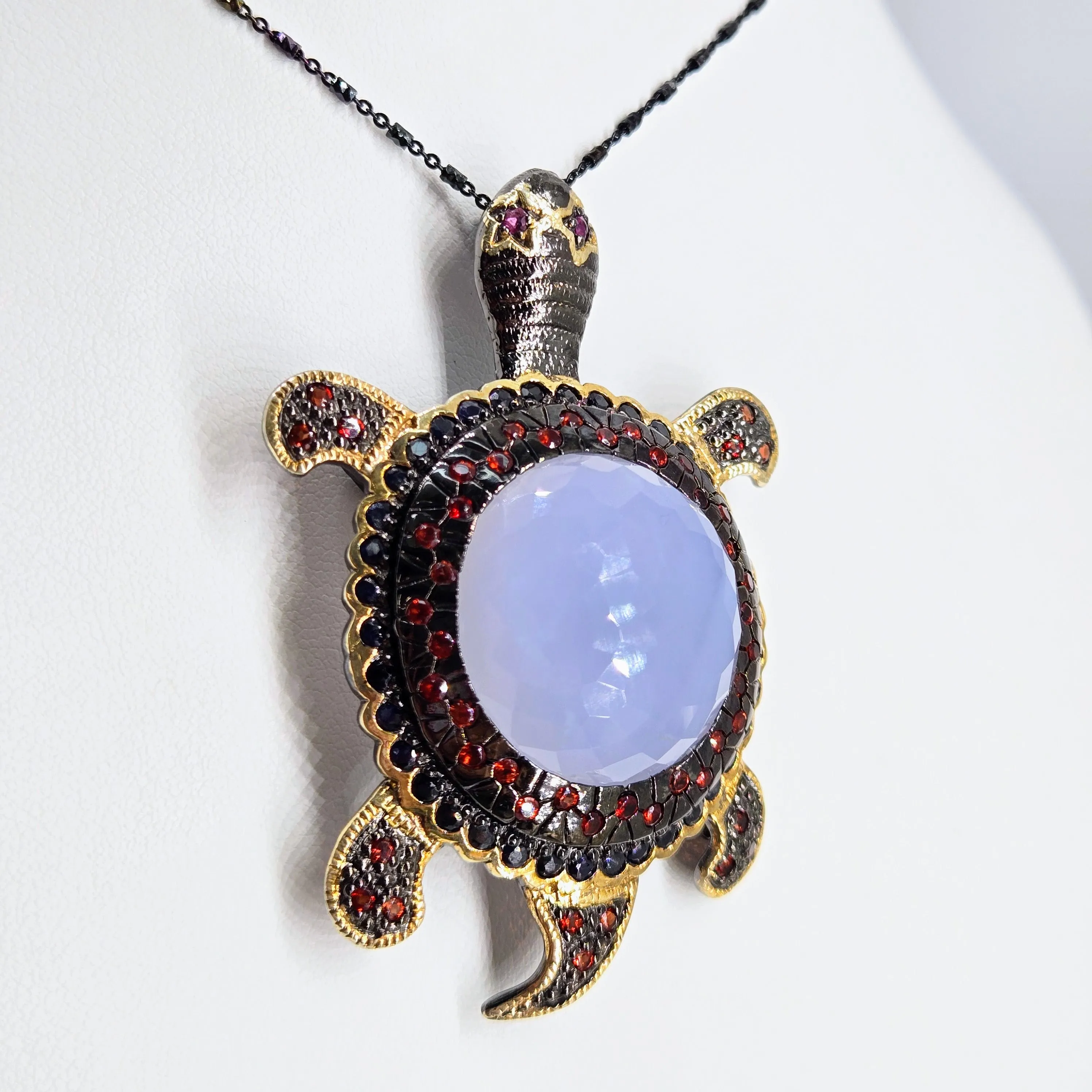 "Starry-Eyed, Flipper-Face!" Pendant/Brooch - Chalcedony, Garnet, Sapphire, Black Sterling, 18k Gold