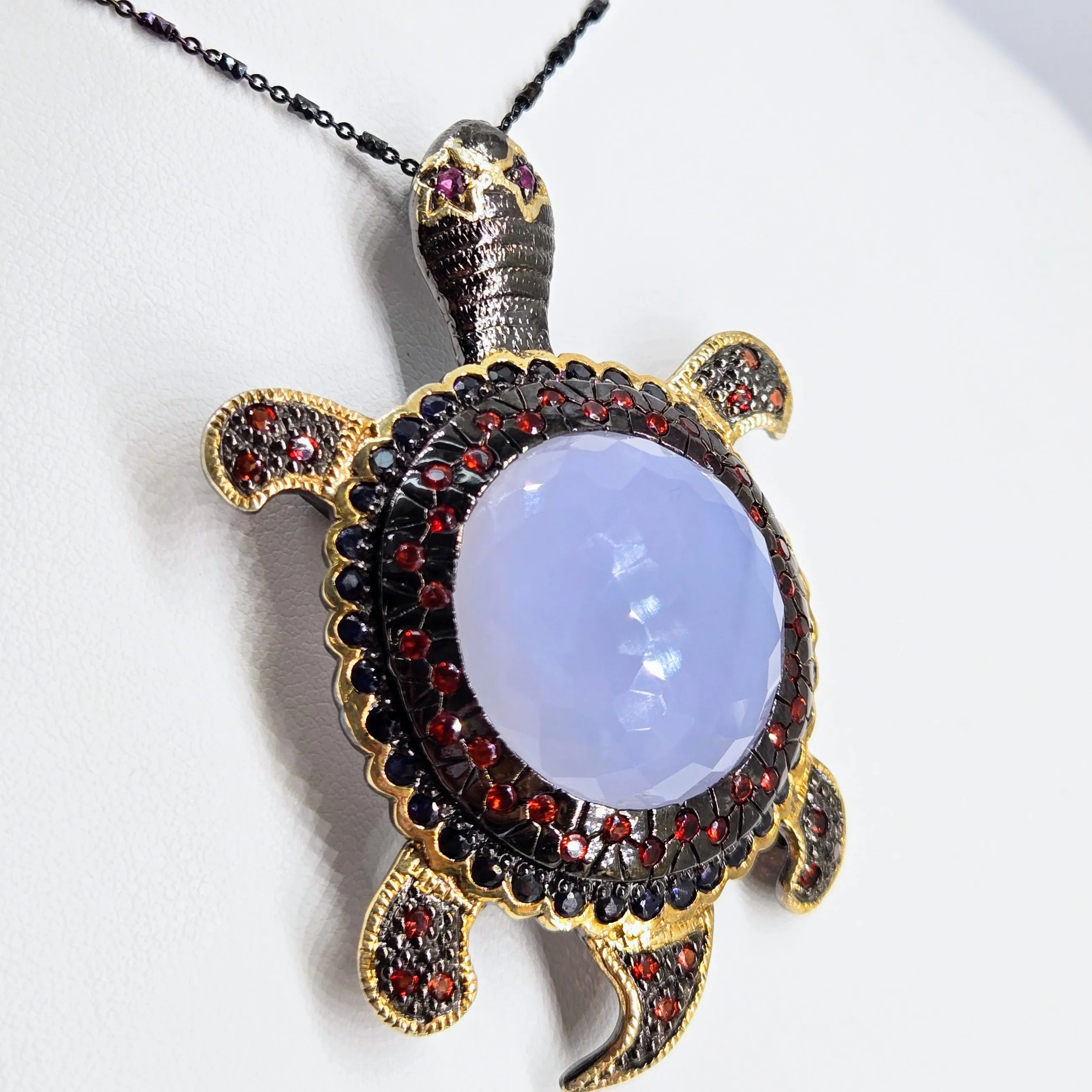 "Starry-Eyed, Flipper-Face!" Pendant/Brooch - Chalcedony, Garnet, Sapphire, Black Sterling, 18k Gold