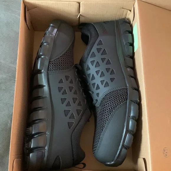 The Reebok® Work Sublite Cushion Work Comp Toe SD